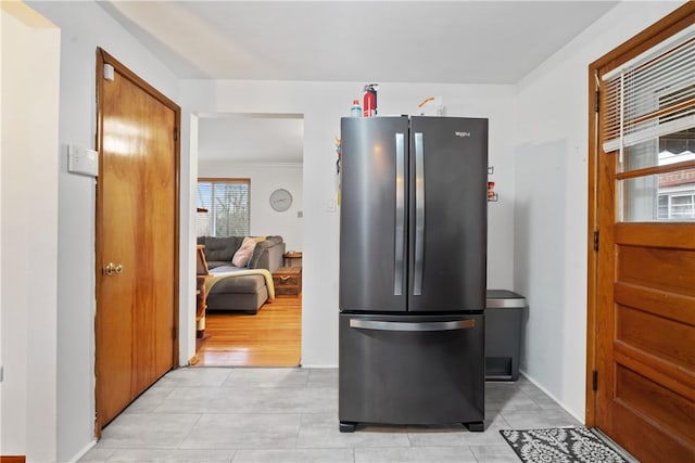 kitchen featuring freestanding refrigerator