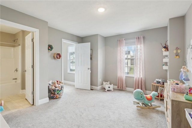 game room featuring baseboards and carpet flooring