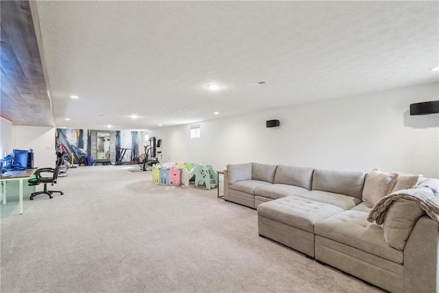 living room featuring carpet floors and recessed lighting