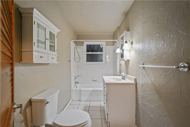 full bath with shower / bathtub combination, toilet, a textured ceiling, vanity, and tile patterned floors