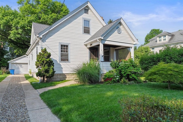 820 Mcdonald St, Sewickley, PA 15143 - bungalow featuring an outbuilding, a front lawn, a porch, a detached garage, and roof with shingles