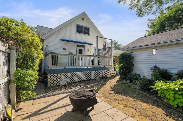 820 Mcdonald St, Sewickley, PA 15143 - rear view of property with a fire pit, a wooden deck, and a patio