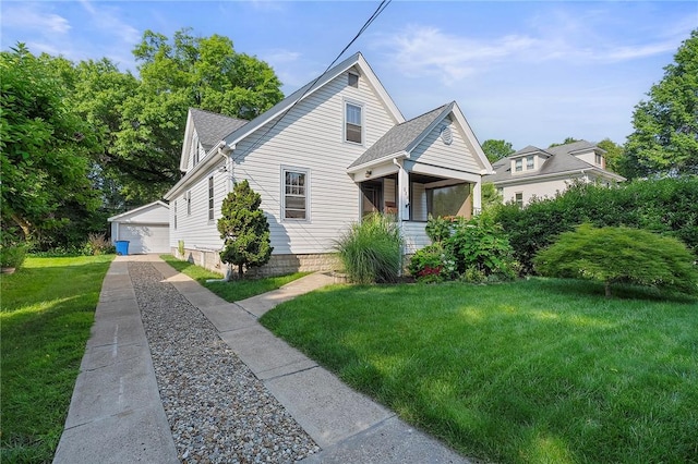 820 Mcdonald St, Sewickley, PA 15143 - bungalow-style house with an outdoor structure, a front yard, a garage, and covered porch