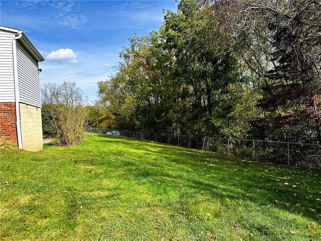 view of yard with fence