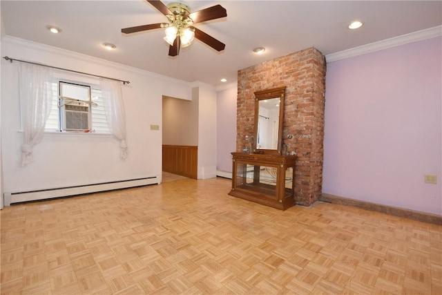 spare room with a baseboard radiator, ornamental molding, a ceiling fan, cooling unit, and baseboards