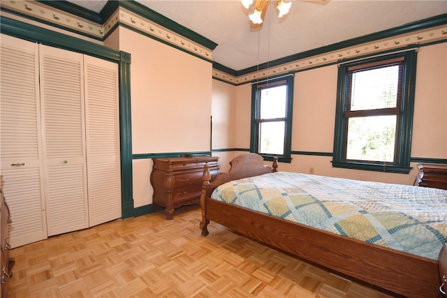 bedroom featuring ornamental molding and a ceiling fan