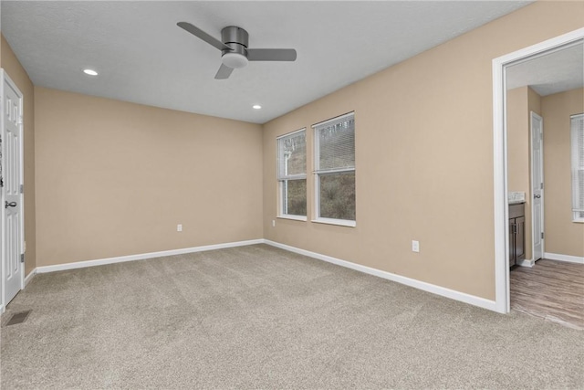 unfurnished bedroom featuring visible vents, baseboards, ceiling fan, carpet, and recessed lighting