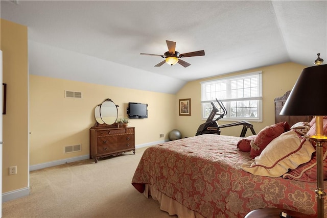 carpeted bedroom featuring visible vents, vaulted ceiling, and baseboards