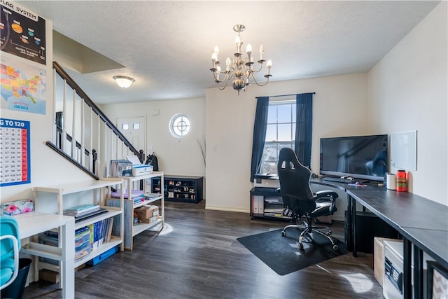 home office featuring a chandelier, a textured ceiling, baseboards, and wood finished floors