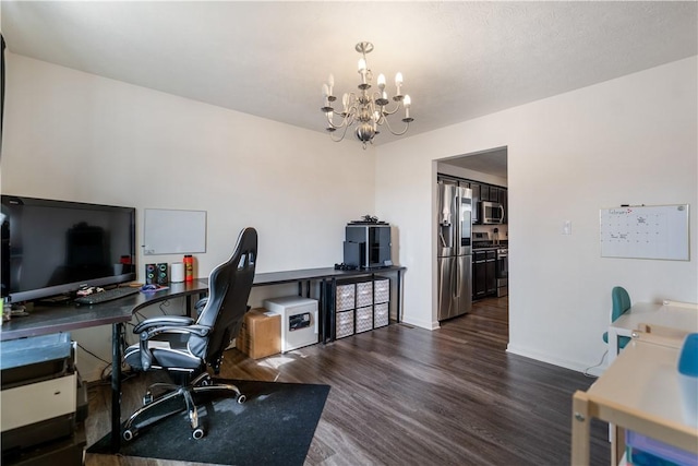 office area featuring baseboards, a chandelier, and wood finished floors