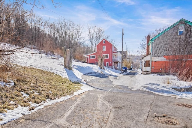 view of street with a barn