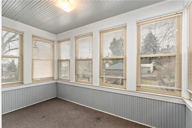 unfurnished sunroom with a healthy amount of sunlight