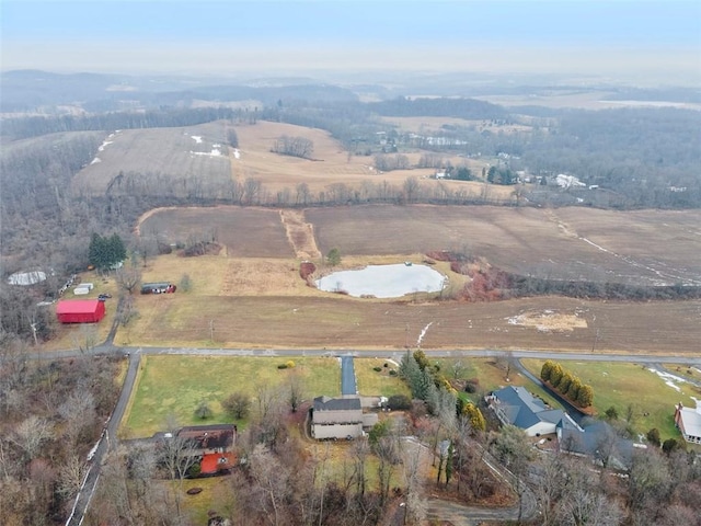 birds eye view of property featuring a rural view