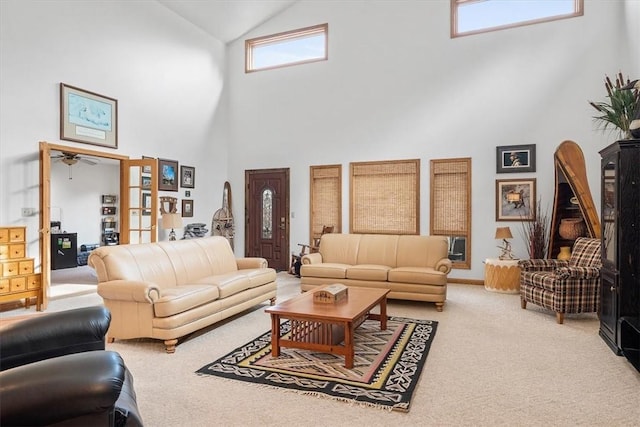 living area featuring carpet and french doors