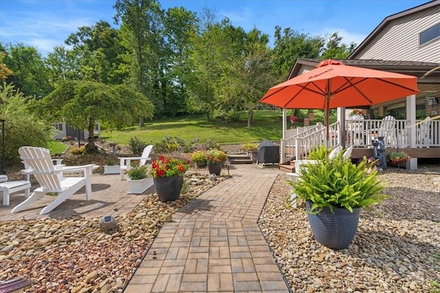 view of patio with a wooden deck