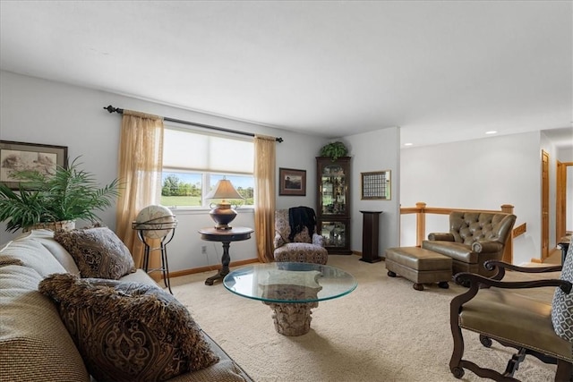 living room with light colored carpet and baseboards