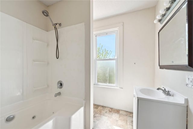 104 Georgetown Ave, West View, PA 15229 - full bath featuring a combined bath / shower with jetted tub, vanity, a wealth of natural light, and stone finish flooring