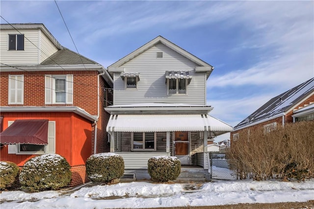 view of front of home featuring brick siding