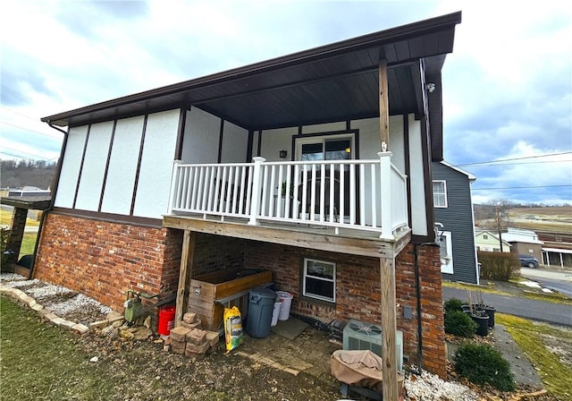 back of property with brick siding