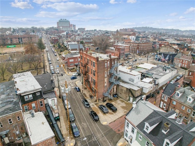 birds eye view of property featuring a city view