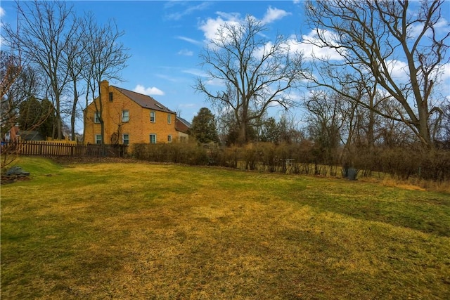 view of yard with fence