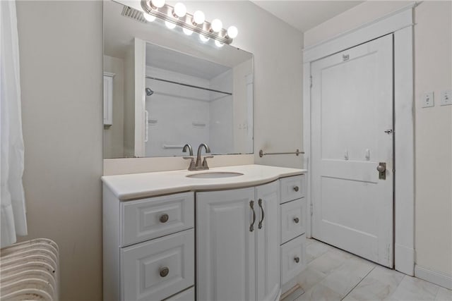 full bath with visible vents and vanity