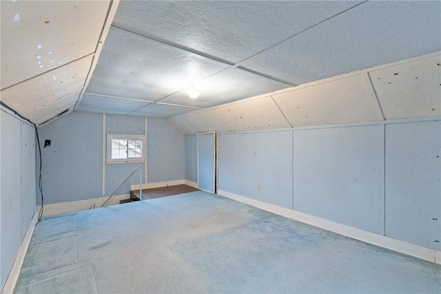 bonus room featuring vaulted ceiling