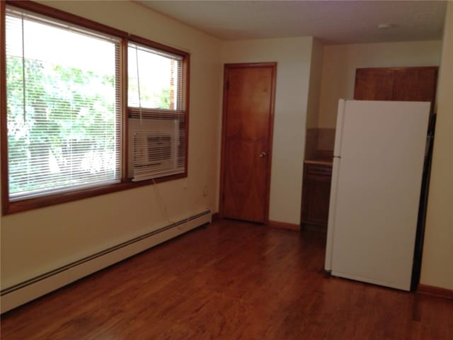 3503 State Route 208, Wilmington Twp, PA 16142 - unfurnished room featuring a baseboard radiator and wood finished floors