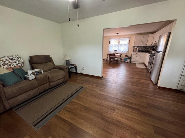 3503 State Route 208, Wilmington Twp, PA 16142 - living area featuring dark wood finished floors and ceiling fan
