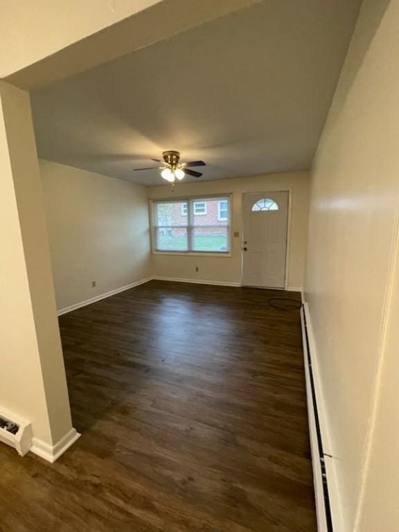 3503 State Route 208, Wilmington Twp, PA 16142 - entrance foyer featuring a baseboard radiator, a ceiling fan, and dark wood-style floors