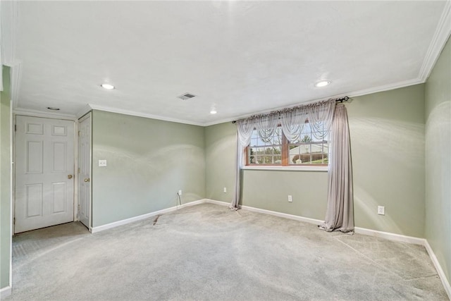 carpeted empty room with recessed lighting, visible vents, crown molding, and baseboards