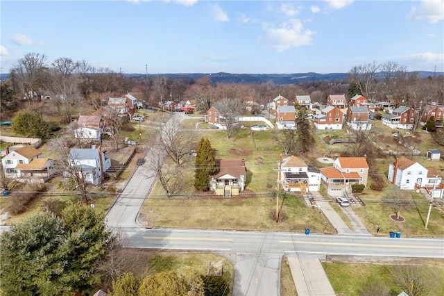 birds eye view of property with a residential view