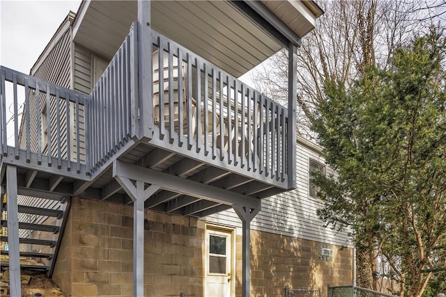 view of home's exterior with a balcony