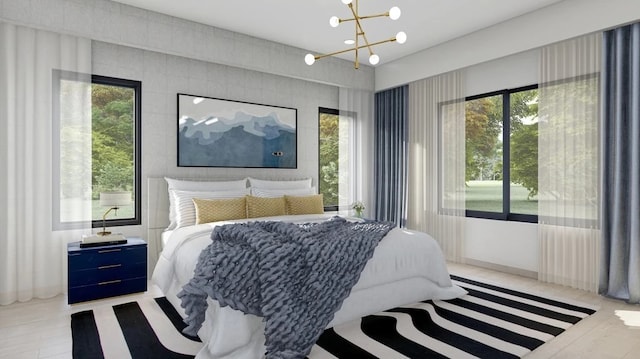 bedroom featuring a notable chandelier