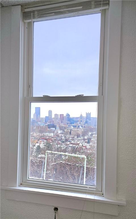 room details with a city view and a textured wall