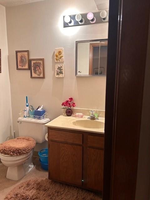 half bath with toilet and vanity