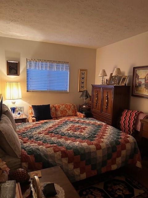 bedroom with a textured ceiling