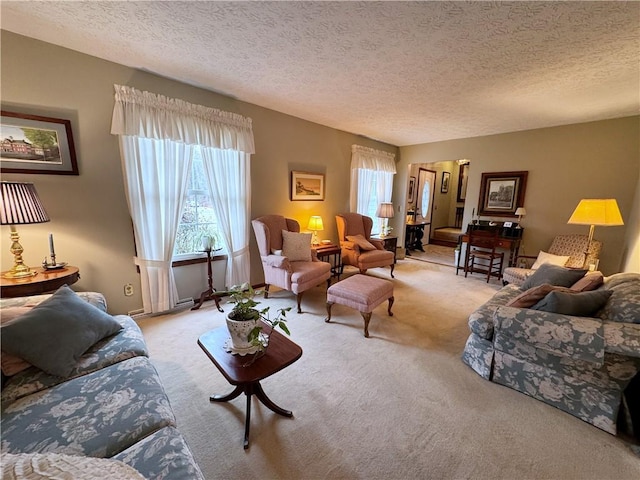 living area featuring a textured ceiling and carpet flooring