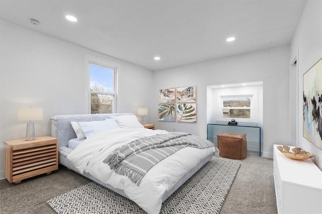 carpeted bedroom with recessed lighting