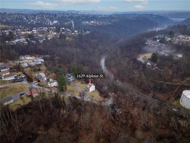 bird's eye view featuring a view of trees