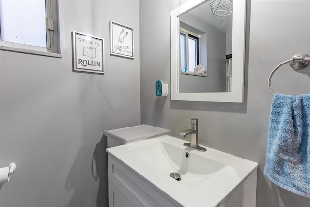 bathroom with a wealth of natural light and vanity