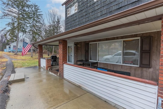 view of patio / terrace featuring covered porch and grilling area