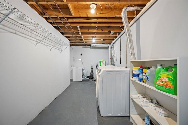 clothes washing area with washer / dryer and laundry area