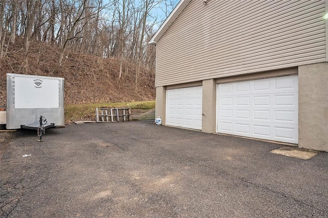 garage with driveway