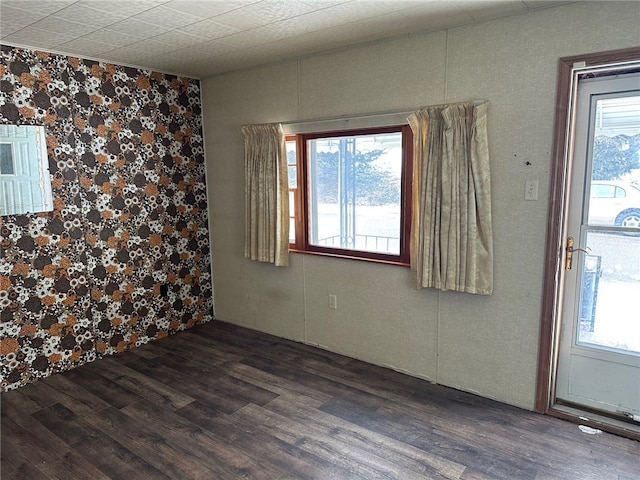 empty room featuring wood finished floors