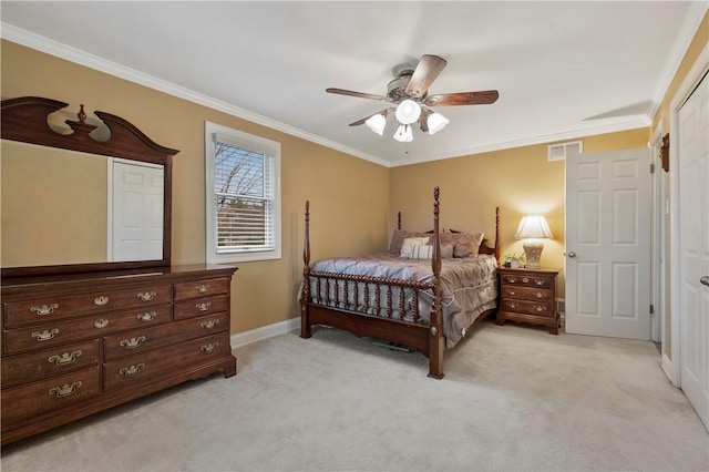 bedroom featuring baseboards, ornamental molding, visible vents, and light colored carpet