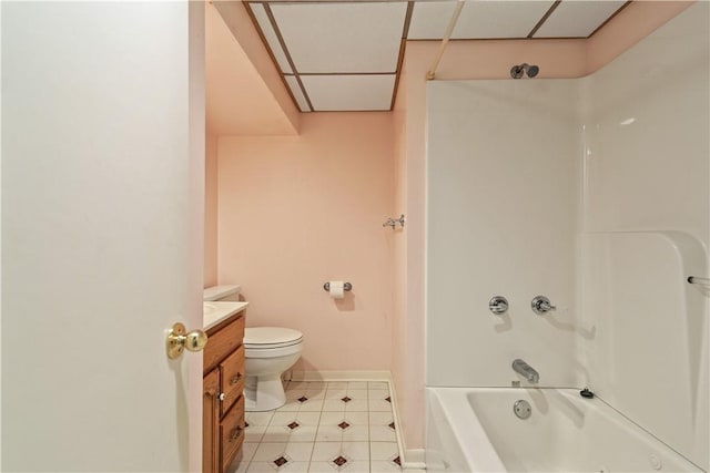 full bathroom featuring toilet, vanity, shower / tub combination, tile patterned flooring, and baseboards