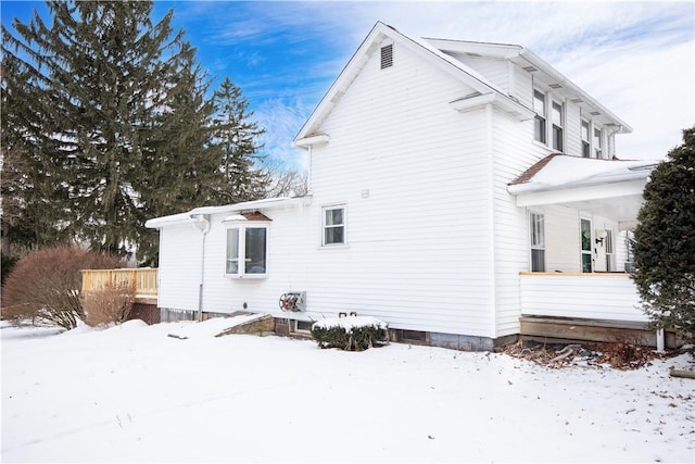 view of snow covered property