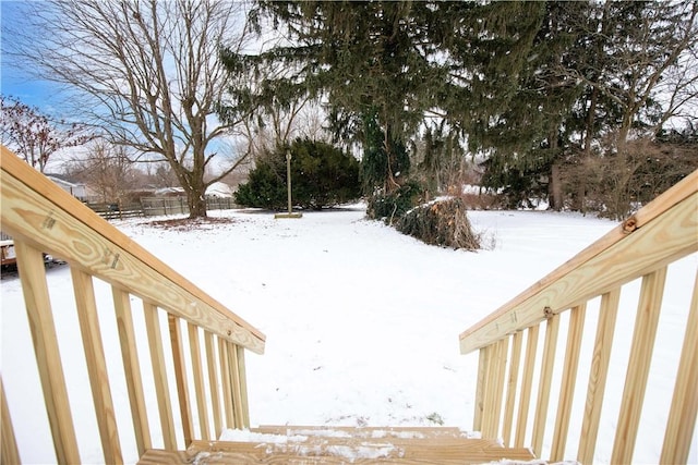 view of yard layered in snow