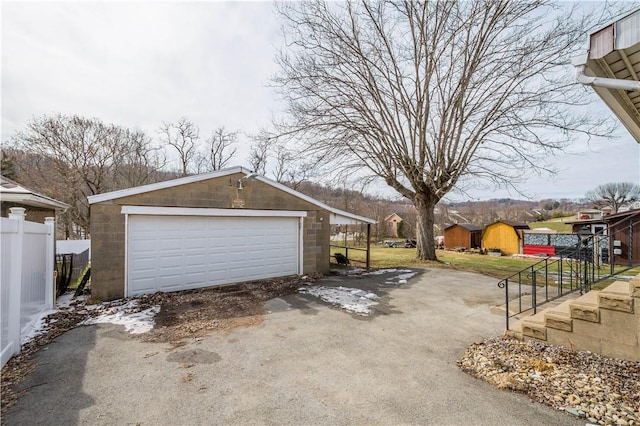 detached garage with fence